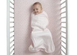 BabyGap TrueSleep Sleep Sack With Built-In Swaddle 19 BabyGap TrueSleep Sleep Sack With Built-In Swaddle -Delta Children Sales Store NU86600GP 1275 sleep sack pink stripe small lifestyle 05 scaled